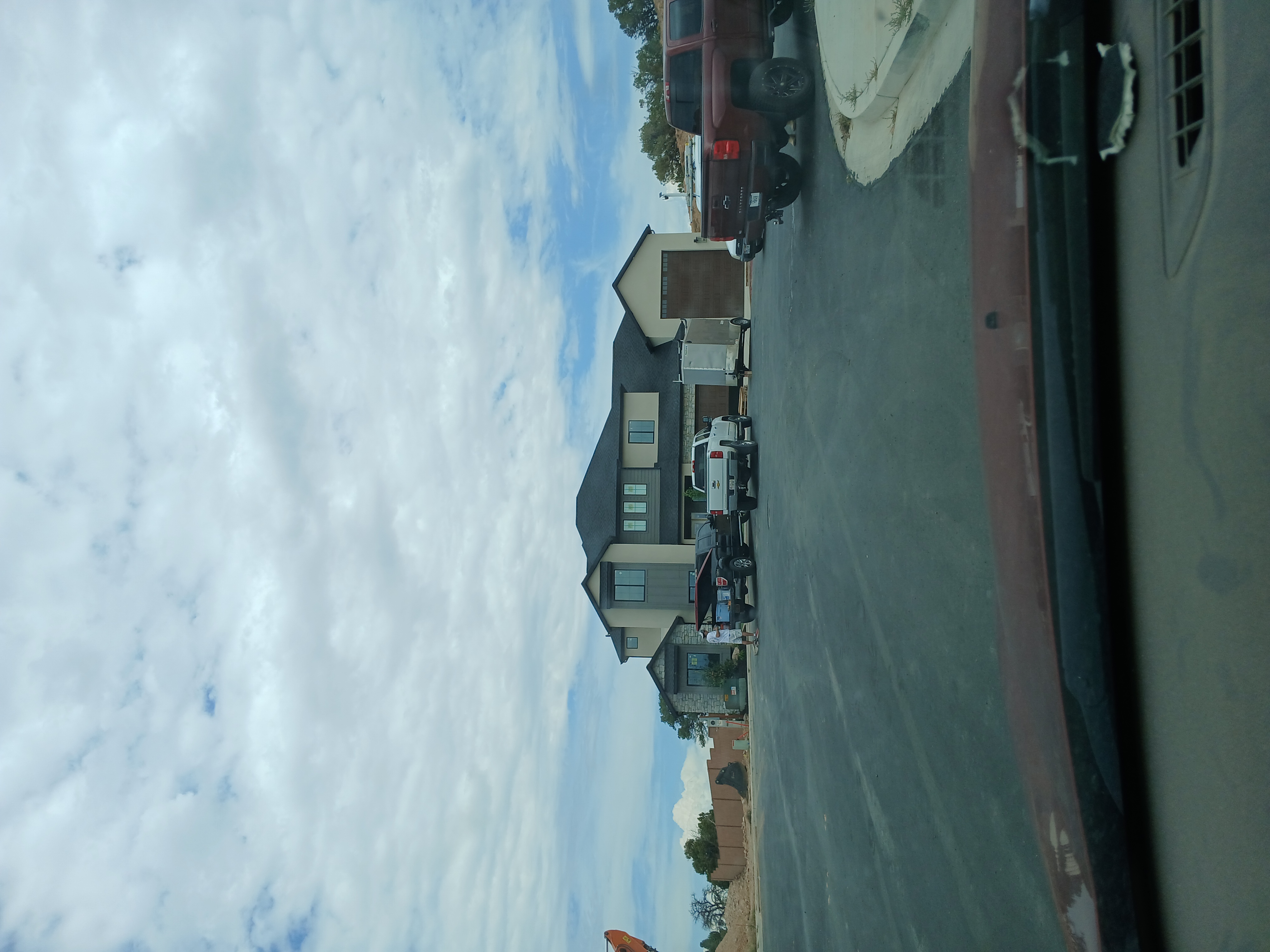 Two-story home build with trucks