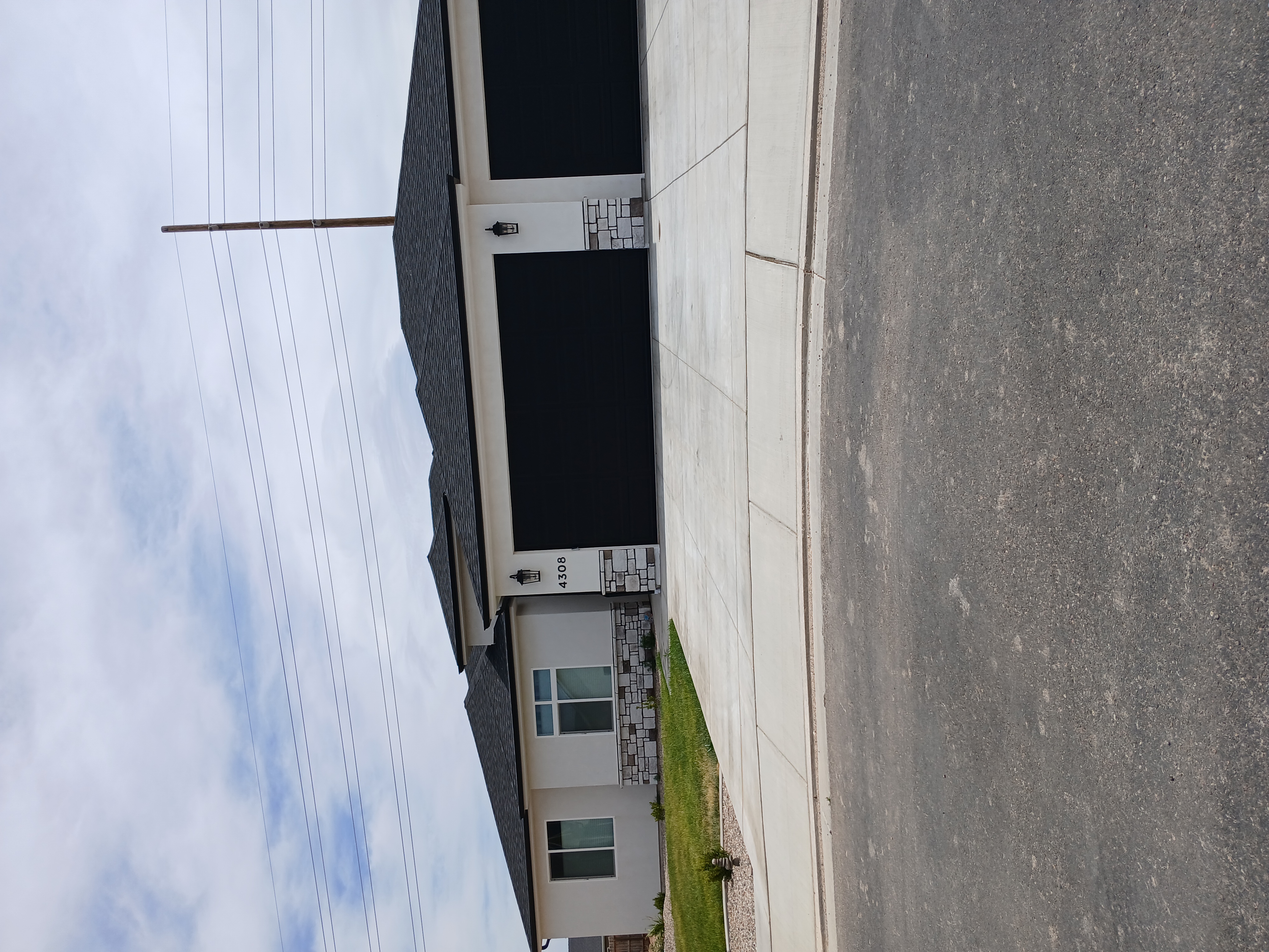 Driveway and 3-car garage